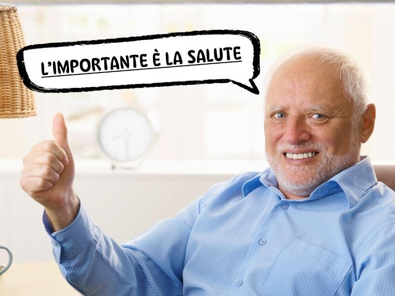 Meme harold hide the pain con fumetto con scritta "l'importante è la salute"